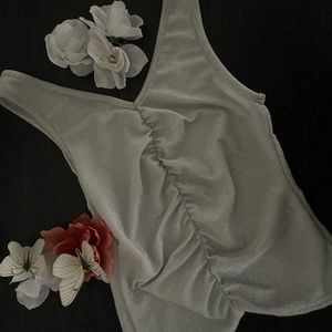 Silver, sparkly sleeveless top. Size S.